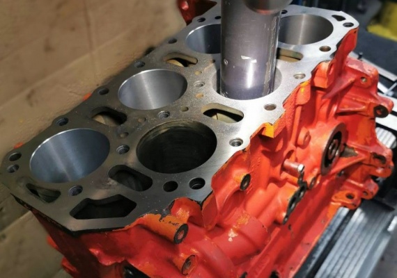 Engine block drilling